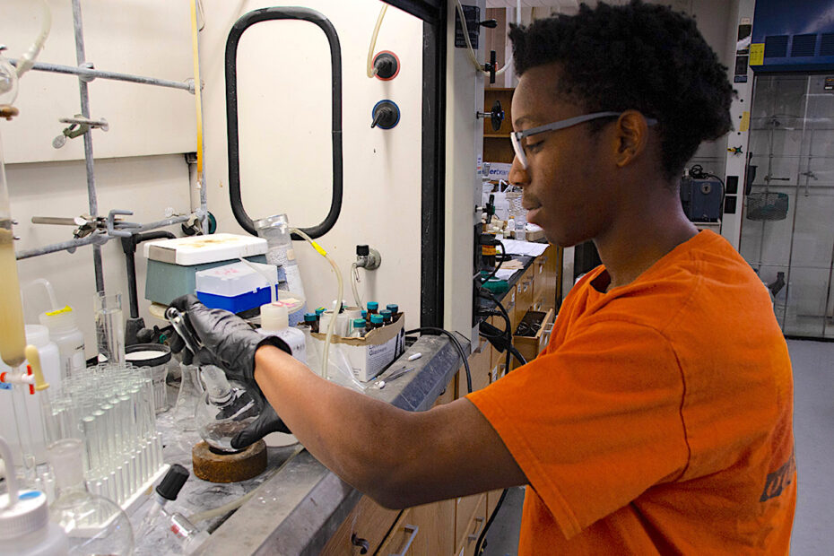 Chemistry student Ian Kilevori works in a lab at the University of Tennessee as part of an internship opportunity.